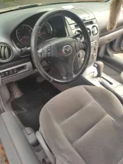 Mazda 6 2004 года, VIN JMZGG12F551248199, госномер Р990РМ177. Мощность 141 л.с. (104 кВт), объем двигателя 1999 куб. см. Масса без нагрузки 1260 кг, разрешенная максимальная масса 1830 кг. Модель двигателя LF 365249, номер кузова 1248199. Цвет кузова темно-серый, тип двигателя бензиновый…