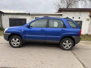 Kia Sportage 2007 года, 140 л.с., пробег 165000 км, полный привод. VIN: KNEJE55257K369889, государственный номер Н114ТВ39. Тип двигателя: бензин, мощность 104 кВт (141 л.с.), цвет кузова синий.