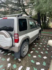 Автомобиль легковой Mitsubishi Pajero Mini, 2004 г.в., цвет серый, идентификационный номер отсутствует, марка Mitsubishi Pajero Mini, гос.рег.знак К044ВТ124. ПТС 25 УМ 814455.