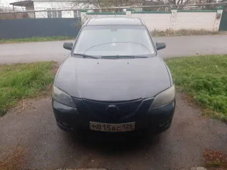 Mazda 3 2005 года выпуска, черный цвет. VIN: JMZBK12Z561296176, госномер: М815АС126. Мощность двигателя 77 л.с. (105 кВт), рабочий объем 1598 куб. см.