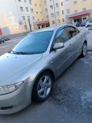 Mazda 6 2005 года, золотистого цвета. VIN JMZGG12F251273800, госномер E611PB186.