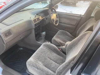 Toyota Corolla, 1997, VIN отсутствует. Характеристика: залог у "Ваш Инвестор". Хрустит наружный шрус с правой стороны. Сайлентблоки и подушки двигателя нужно менять. По корпусу автомобиля множественные следы коррозии и левая сторона в вмятинах.