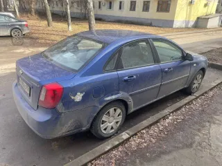 Chevrolet Lacetti 2009 года выпуска, синий цвет. VIN: XUUNA196J9C001296.
