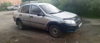 Lada Granta 2014 года, 87 л.с., пробег 144 000 км. Двигатель бензиновый 1.6 л (1596 см³), механическая КПП. Состояние удовлетворительное. Местонахождение: Архангельская область, п. Лойга. VIN: XTA219060EY095703.