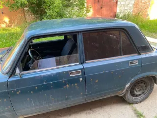 Легковой автомобиль ВАЗ 2107, 1996 г.в. Марка: ВАЗ, модель: 2107, год изготовления: 1996, цвет: зеленый, VIN: XTA210700V1024079, г/н: К184АН40. Особенности тех. состояния: коррозии по всей поверхности кузова, сквозная коррозия на порогах