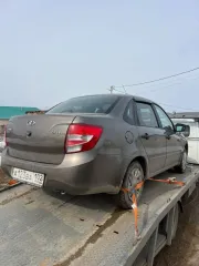 Lada Granta 2016 года, 87 л.с., пробег 168100 км. Цвет золотисто-коричневый, VIN XTA219010H0428144. Автомобиль заводится, на ходу. Имеется вмятина на задней левой двери. Находится в залоге. Местоположение: г. Уфа.