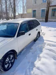 Легковой автомобиль, марка: Toyota, модель: Corolla, год изготовления: 1998, цвет: белый, г/н: К210УА28, двигатель №: 5Е-1325736.