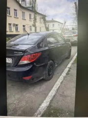 Легковой автомобиль HYUNDAI SOLARIS, 2011 г.в., г/н М609НЕ761, VIN Z94CT41CABR064210, черного цвета, ТС после ДТП, повреждены передний бампер, задний бампер, заднее левое крыло полностью помятое, на багажнике есть вмятины, на правом крыле есть потертости, низ задней левой двери выгнут в обратную…