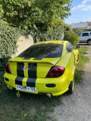 Hyundai Tuscani 2001, VIN: KMHHN61DP1U001496, год выпуска 2001, цвет серый.