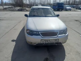 Daewoo Nexia 2009, модель: Нексия, год изготовления: 2009, цвет: перламутрово-серебр