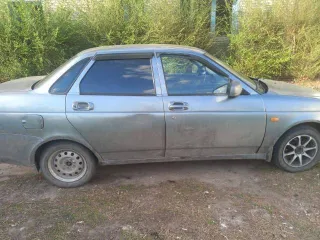 Lada Priora 2010 года, 98 л.с., пробег 205000 км. VIN XTA217030A0233438, госномер В779АЕ763. Цвет — средний серо-зеленый металлик.