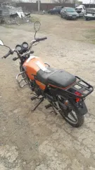 Мотоцикл марки Racer RS 110 N, VIN Z9RM32031N1202967, оранжевого цвета, без государственных регистрационных знаков. Назначение: pryamie. Марка, модель: Racer RS 110 N. Год выпуска: не указан. Вид транспорта: мотоцикл.