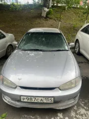 Автомобиль Mitsubishi Mirage, 1997 года выпуска, VIN: отсутствует. Тип ТС: легковой универсал, номер кузова CJ2A0102090, государственный регистрационный номер Р987СА154, паспорт транспортного средства 54НХ962098. Цвет кузова: серый.