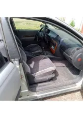 Opel Omega 1996 года выпуска, цвет серебристый (белый), номерной знак MO86MB13, VIN: W0L000026T1115447. Автомобиль на ходу, на зимней резине. Прогорела выхлопная система, климат не работает, трещина на лобовом стекле, проблемы с маслом. Основные лампочки горят. Горит чек, на движение не влияет…