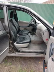 Лада Калина 2010 года, VIN: XTA111940A0113921, цвет черный.