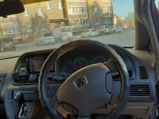 Honda Odyssey 2001 года выпуска. Марка: Honda, модель: Odyssey. VIN кузова: RA61102963. Автомобиль находится в Новосибирске по адресу: ул. Романтиков, 26. По вопросам осмотра и дополнительной информации звоните по телефону: +7 (913) 726-73-43.