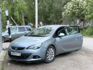 OPEL ASTRA GTC 2012. Марка - OPEL; Модель – ASTRA GTC P-J/SW; Год изготовления – 2012; VIN - XWFPD2DC1C0012226 (залог ООО МКК КАРАНГА)
