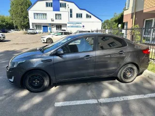 Kia Rio 2014, VIN: Z94CC41BAER219501, цвет: темно-серый.
