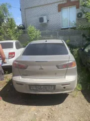 Mitsubishi Lancer 2012 года, 117 лс, регистрационный номер С946СК57, VIN код JMBSNCY1ACU004271, автомобиль легковой, цвет кузова коричневый.