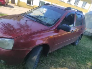 Автомобиль LADA Kalina 2012 года выпуска, государственный номер Р114МВ136, цвет серебристо-красный, VIN XTA111730D0249292. По кузову имеются следы коррозии и царапины. На задней правой и левой арках имеются следы сквозной коррозии. На заднем бампере имеются царапины, на переднем бампере — трещина…