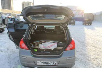 Nissan Tiida 2008 года, 110 л.с., АКПП. Автомобиль легковой Nissan Tiida 1.6, 2008 года выпуска, государственный регистрационный знак Е918ВМ154, VIN 3N1FCAC11UL445513.