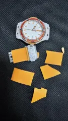 Часы Hublot с оранжевым ремнем и белым керамическим корпусом 74-017422-6, вставка серебристого цвета с оранжевыми кристаллами (годные остатки).