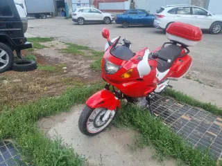 Honda NT650V 2000 Мотоцикл, марка ХОНДА NT650V, модель HONDA NT650V, год выпуска 2000, VIN VTMRC47A0YE321299, цвет красный белый. Мотоцикл не заводится, требуется диагностика и ремонт.