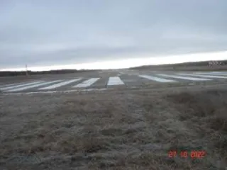 Взлетно-посадочная полоса в аэропорту г. Кедровый. Нежилое сооружение – взлётно-посадочная полоса, протяженность 1980 м, ширина 36 м. Кадастровый номер 70:18:0000006:910, адрес Томская область, г. Кедровый, квартал 22, сооружение 55а