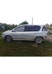Toyota Ipsum 1996 года, белый цвет. VIN-номер кузова: SXM100016910. Двигатель бензиновый, объем 1998 см³, мощность 140 л.с. (103 кВт). ПТС 54 PA 149249, госномер А239МС154. Максимальная разрешенная масса 1450 кг, снаряженная масса 940 кг. Производство Япония.