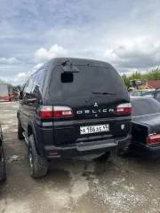 Mitsubishi Delica Space Gear, 2005, г/н: А186АЕ49, цвет чёрный, номер кузова: PD6W1002121 (документы и ключи отсутствуют). Имущество находится в Федеральной собственности. Продается в том виде, комплектности и состоянии, в каком оно есть. За скрытые дефекты Продавец ответственности не несет…