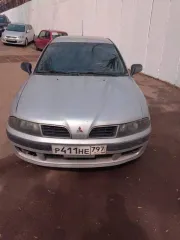Mitsubishi Carisma 2001, автомобиль Mitsubishi Carisma HB 1.6, 2001 год выпуска, госномер Р411НЕ797, VIN XMCLNDA1A2F004419.
