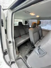 Volkswagen Caravelle 2014, легковой универсал, дизельный, объем двигателя 1968 куб.см, мощность 84 л.с. (62,0 кВт), механическая коробка передач, пробег 180990 км, цвет белый, VIN XW8ZZZ7HZFG001406, госномер B093XA178.