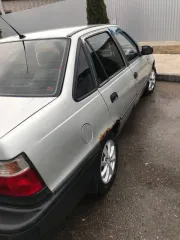 Daewoo Nexia 2006 года выпуска, серый светлый, VIN: XWB3D31UD6A067407, госномер: A821MC73.