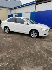 Mitsubishi Lancer 2010 года, 109 л.с., пробег 232 245 км, АКПП, бензин, VIN – JMBSRCY2AAU005626.