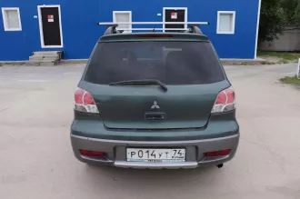 Mitsubishi Outlander 2.4, 
Цвет - Зеленый, 
Тип ТС - Легковые автомобили универсал, 
Год выпуска 2006, 
Объем двигателя - 2378.0, 
Номер двигателя - LT4499, 
Мощность двигателя - 160.0лс., 
Категория - В, 
VIN номер - JMBXNCU5W6U001171, 
Номер кузова - JMBXNCU5W6U001171, 
ГРЗ Р014УТ74…