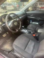 Mazda 3 2006 года, 105 л.с., пробег 310218 км, АКПП, красный цвет. VIN JMZBK12Z571573381, модель, номер двигателя Z6 520824, кузов JMZBK12Z571573381.