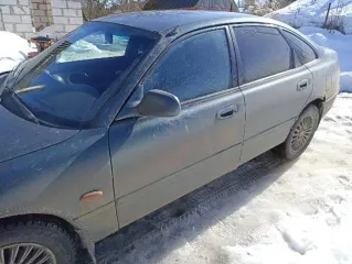 Mazda 626, 1997 года, 115 лс, 329801 км. Легковой автомобиль, марка: МАЗДА, модель: 626, год изготовления: 1997, цвет: зеленый, VIN: JMZGE14J201492366, ПТС: 57 ТА 577432, г/н: К922ТР32, модель двигателя: FS, тип двигателя: бензиновый, двигатель №: 230617, мощность двигателя, л. с. (кВт): 115 (85)…