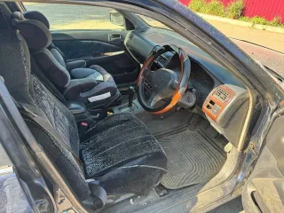 Toyota Carina, 1990 год выпуска, регистрационный знак Р656ЕТ03RUS, VIN не установлен, цвет темно-синий.