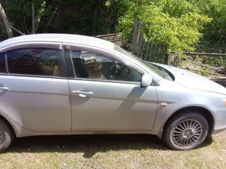 Mitsubishi Lancer 2008 года, 143 лс, пробег 300000 км, АКПП. VIN: JMBSTCY3A9U003726, госномер К475МК122.