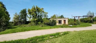 Здания гаража-ангара 547,9 кв.м, главного корпуса 1855,4 кв.м, КПП 28,9 кв.м, автогаража 2513,1 кв.м с земельным участком 26235 кв.м, Курганская область Объекты недвижимого имущества, расположенные на земельном участке, по адресу: Курганская область, г. Курган, ул. Омская, д. 179В Объекты…