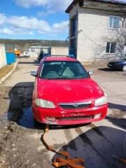 Mazda Familia, 1999. Автомобиль Mazda Familia, г/н М076МА124 (отсутствует), 1999 г.в., кузов № BJ5W122390, двигатель № 282143, цвет красный. Рабочее состояние, и комплектность автомобиля не проверялось. Находится в г. Зеленогорск, данное имущество обращено в доход государства (Документы…