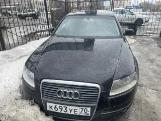 Audi A6 2006 года выпуска. VIN: WAUZZZ4F56N190905. ПТС 77 ТН 821424. Кузов черного цвета. Пробег 446415 км. Объем двигателя 2.4 л (2393 куб. см), бензиновый, мощность 177 л.с. Коробка передач — АКПП, привод задний. Экологический класс — 4. Государственный регистрационный знак К693УЕ70.